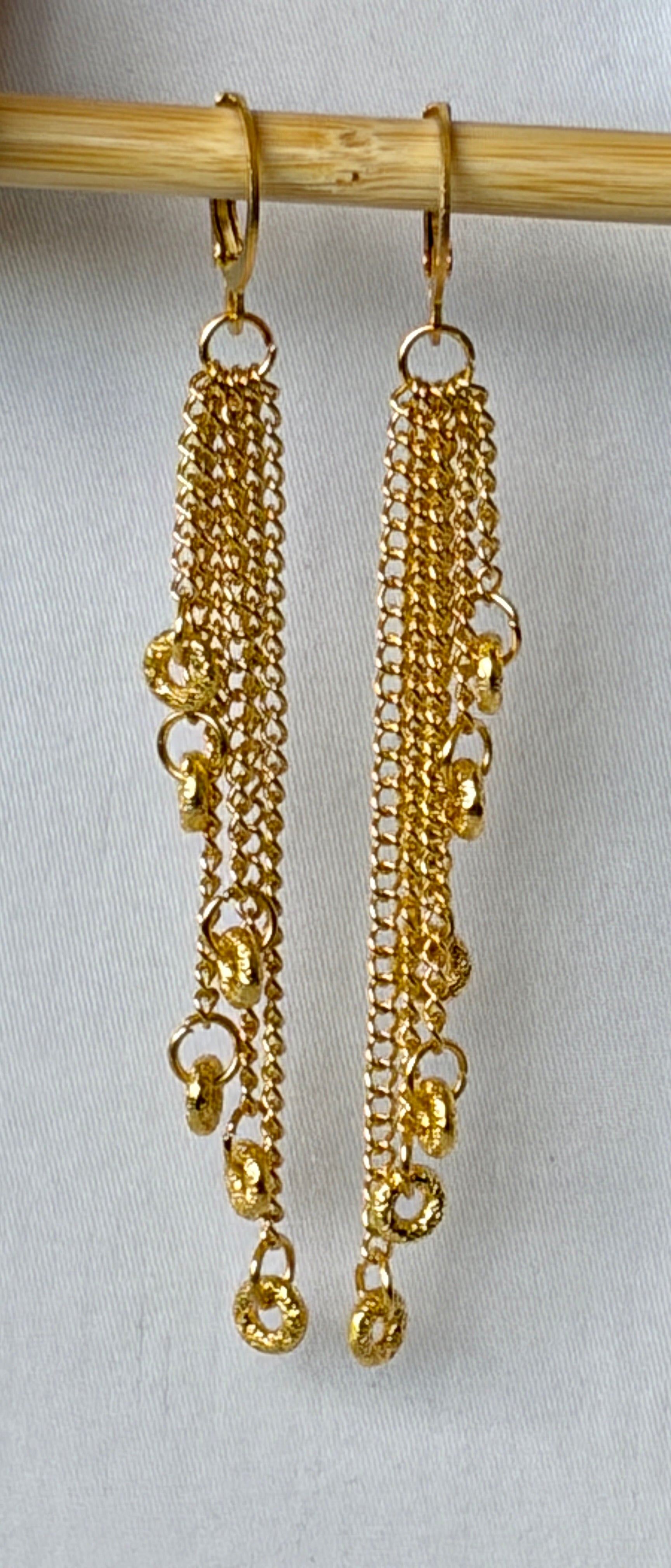 Gold Multi-Chain Tassel Drop Earrings with Coiled Ring Charms