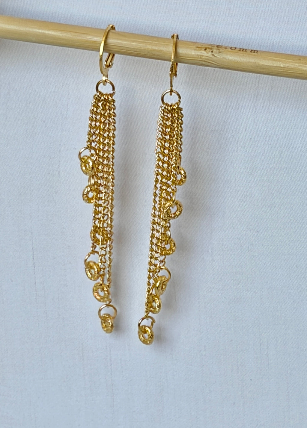 Gold Multi-Chain Tassel Drop Earrings with Coiled Ring Charms