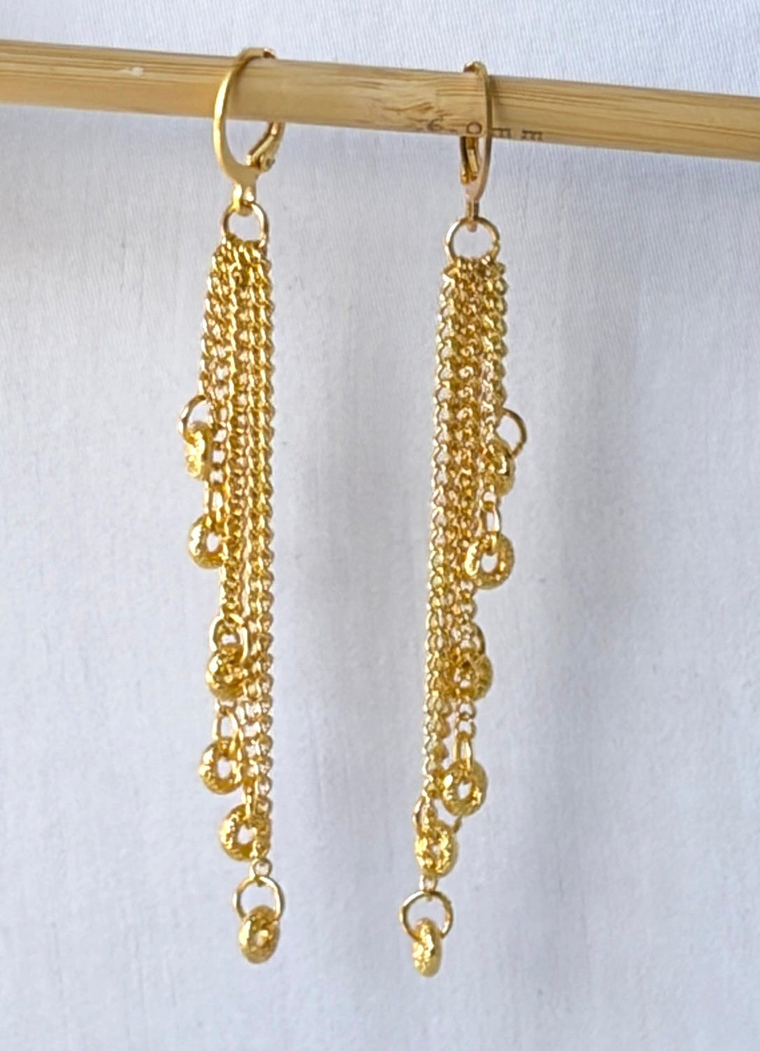 Gold Multi-Chain Tassel Drop Earrings with Coiled Ring Charms